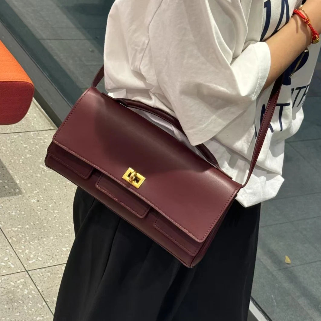 Genuine leather handbag 2025 new niche design lock small square bag vintage motorcycle style cowhide one-shoulder crossbody bag